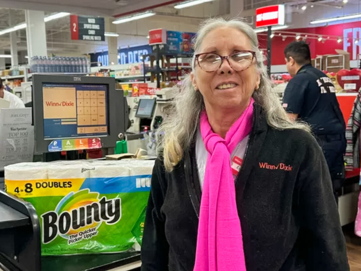 woman standing at checkout